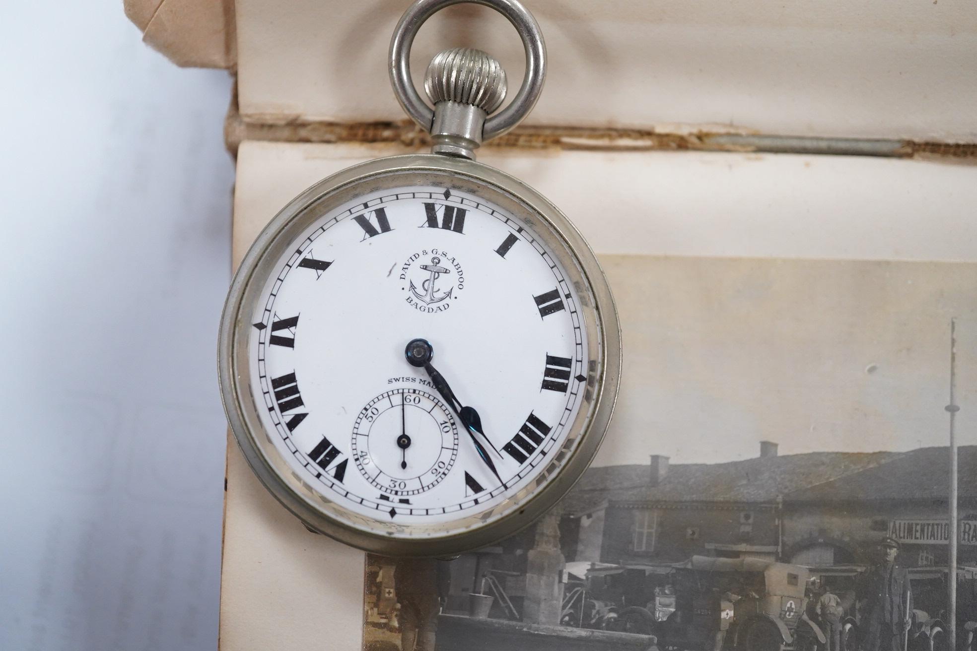 A WWI Ambulance and Balloon Brigade photograph album, pocket watch, coin, etc. Condition - fair, pocket watch ticks when wound